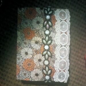 Brown/neutrals with pops of retro colors, distressed, vintage junk journal